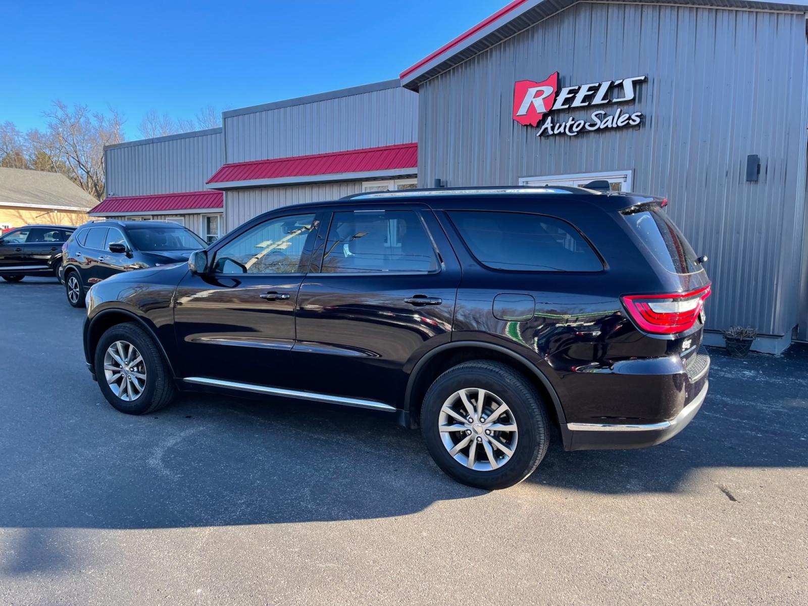 2018 Purple /Black Dodge Durango SXT Plus AWD (1C4RDJAG4JC) with an 3.6L V6 DOHC 24V engine, 8A transmission, located at 547 E. Main St., Orwell, OH, 44076, (440) 437-5893, 41.535435, -80.847855 - This 2018 Dodge Durango SXT Plus AWD is equipped with a powerful 3.6 Pentastar V6 engine paired with an 8-speed automatic transmission, offering a blend of performance and efficiency. This model features a comfortable interior with a power driver's seat, heated front seats, and a heated steering whe - Photo #11